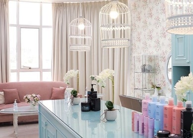 Plush Beauty Spa in Abu Dhabi, AE offers a serene setting with pastel interiors and sophisticated ambiance.