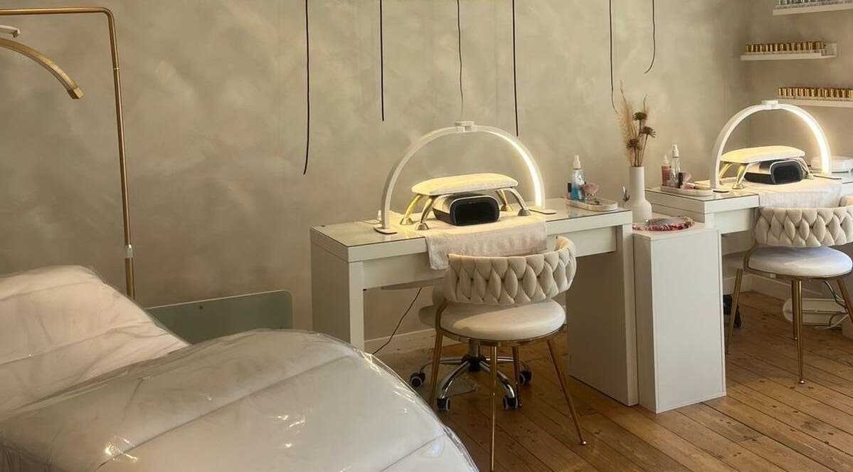 Elegant beauty treatment room at RH Therapies, Mauchline, Scotland, GB with modern decor and treatment beds.