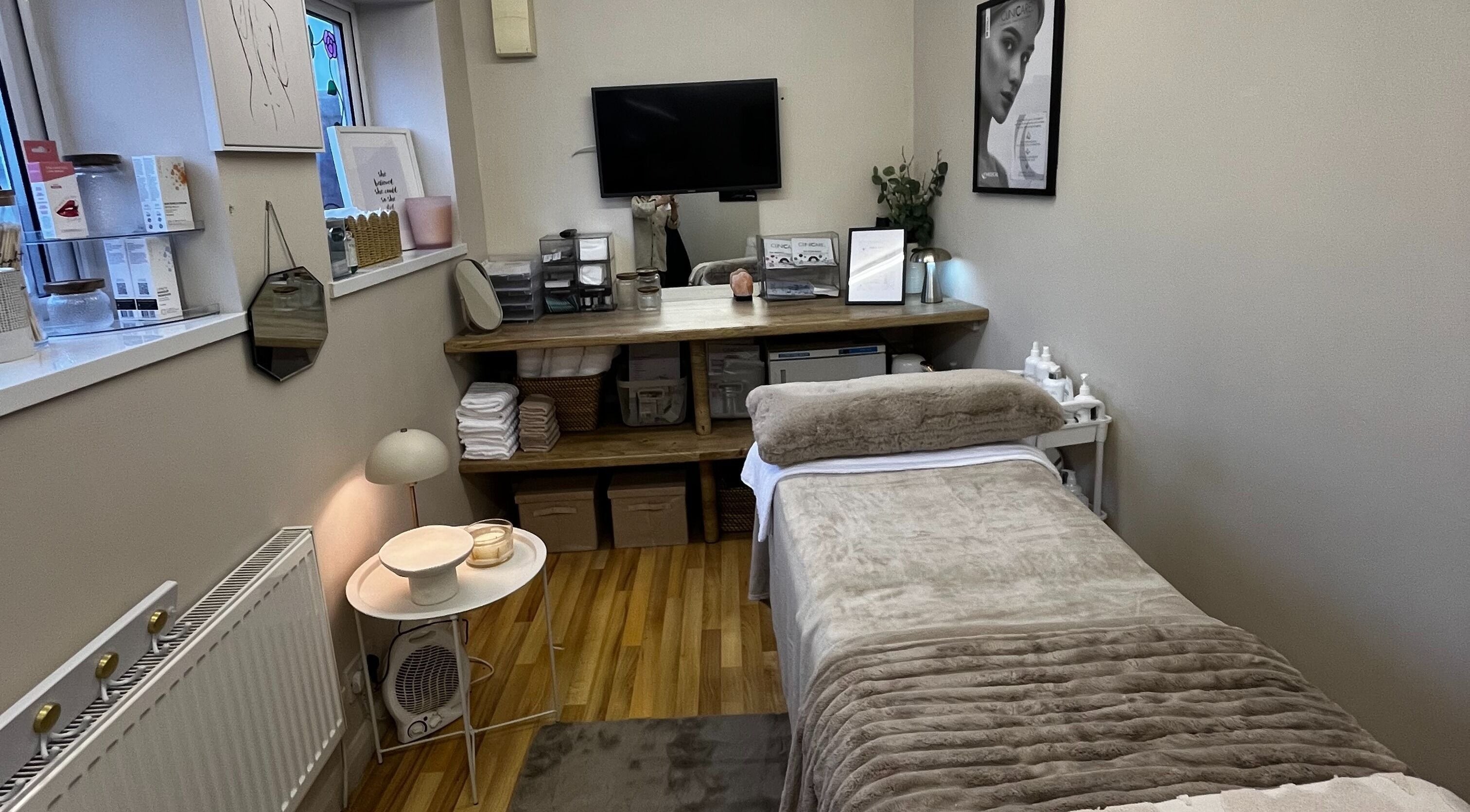 Cozy treatment room at Jel Beauty, Sully, Wales, GB with a serene decor and calming atmosphere.