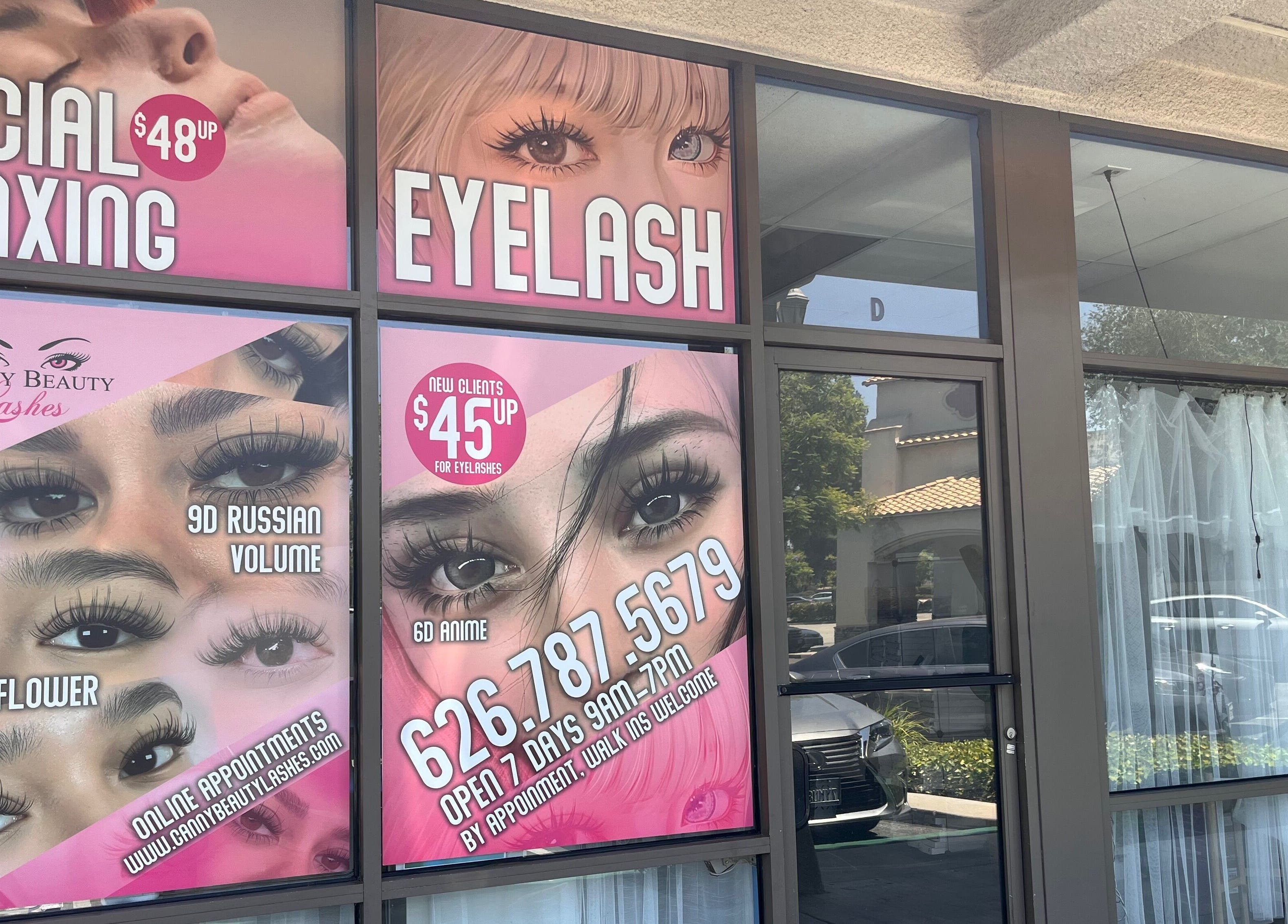 Canny Beauty Lashes in San Dimas showcases eyelash services and prices on shop window, San Dimas, California, US.
