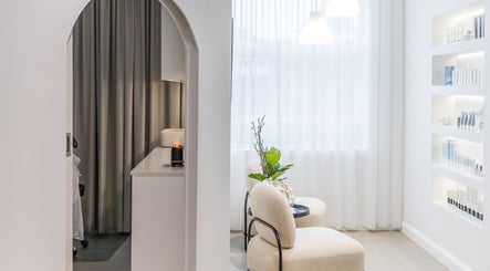 Elegant seating area at Simply Luminous Skin, Wentworth Point, New South Wales, AU, with soft lighting and decor.