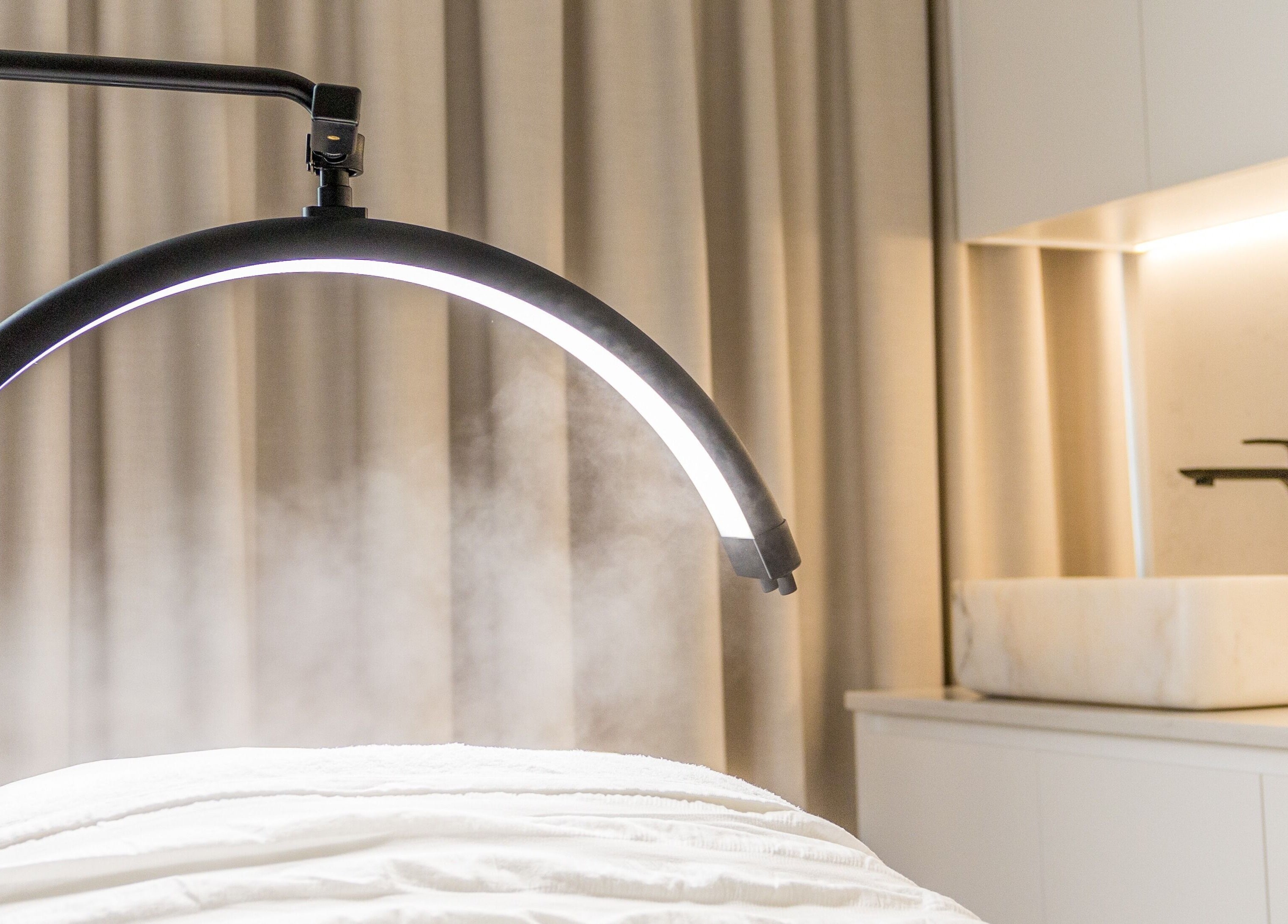 Serene treatment room at Simply Luminous Skin in Wentworth Point, New South Wales, AU with modern spa equipment.