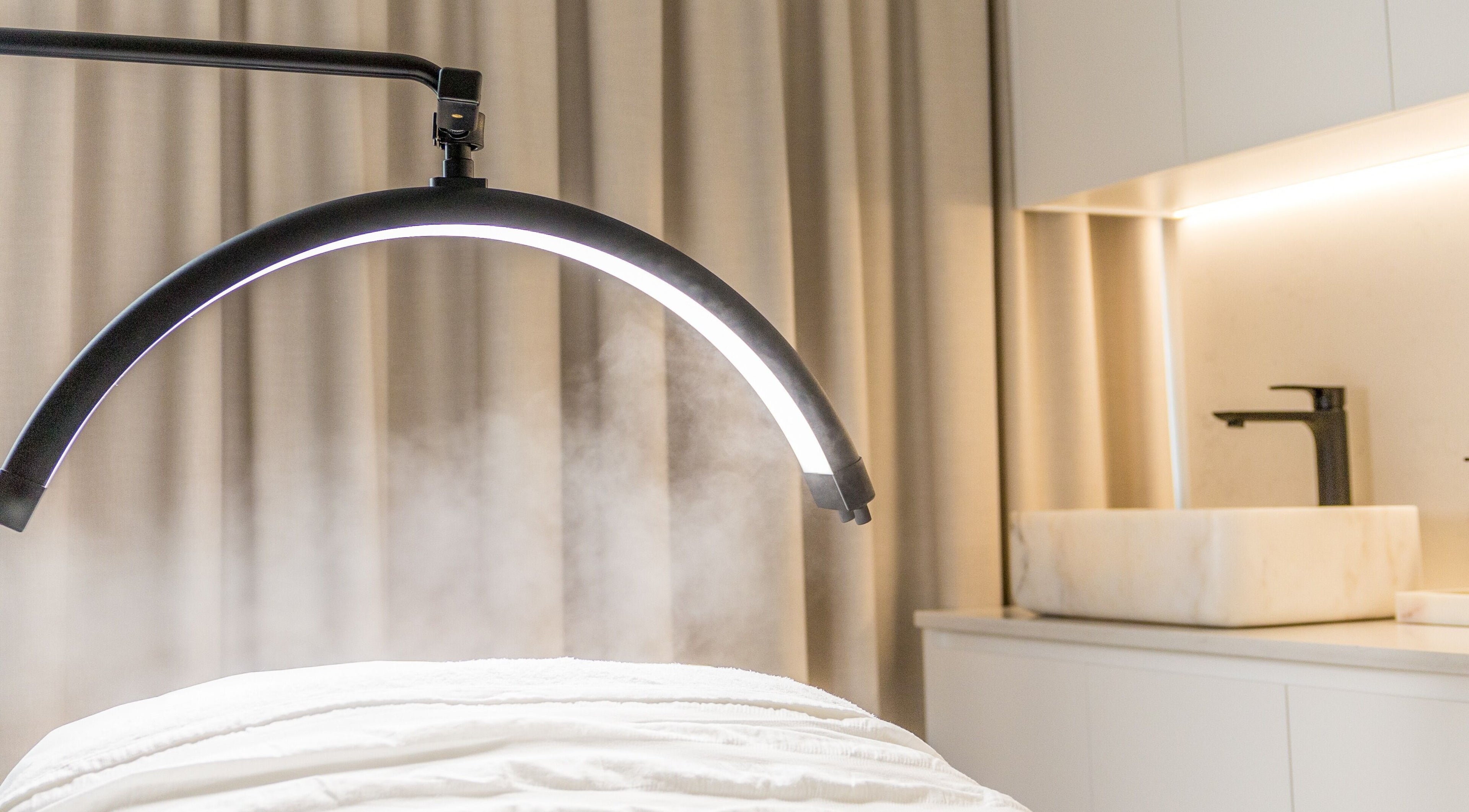 Serene treatment room at Simply Luminous Skin in Wentworth Point, New South Wales, AU with modern spa equipment.