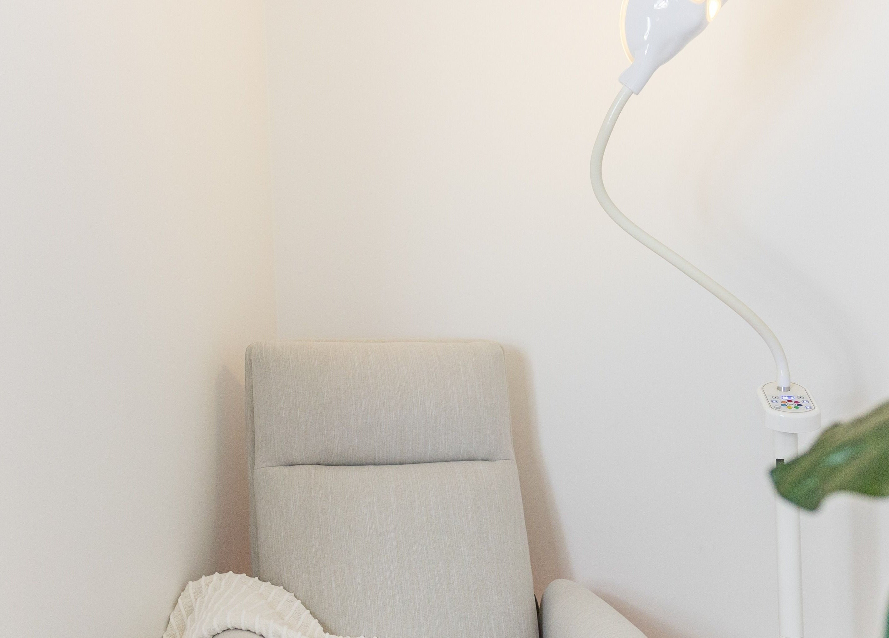 Cozy chair and lamp at Simply Luminous Skin, Wentworth Point, New South Wales, AU.