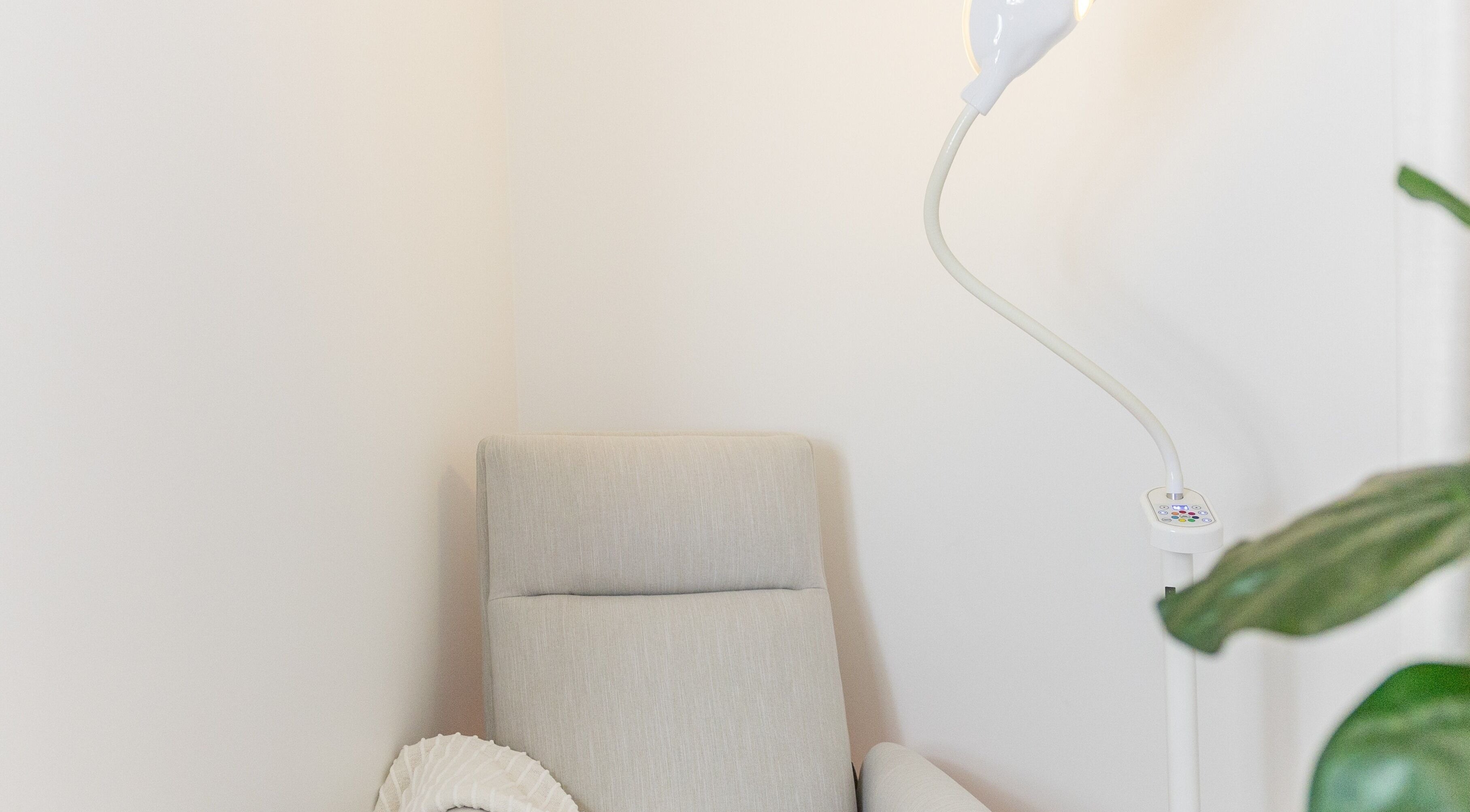 Cozy chair and lamp at Simply Luminous Skin, Wentworth Point, New South Wales, AU.