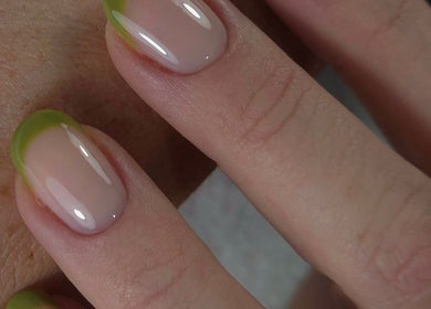 Close-up of a green-tipped manicure at Shardilly Nails, located in Hebburn, England, GB.