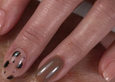 Elegant nail art with brown and black design at Shardilly Nails, Hebburn, England, GB.