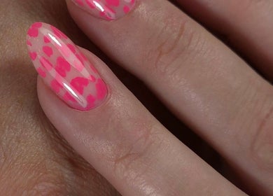 Vivid pink dotted nail art at Shardilly Nails, Hebburn, England, GB showcasing intricate design.