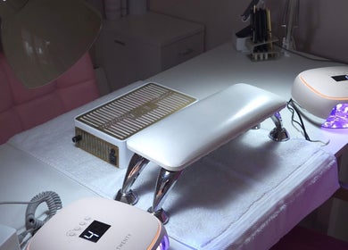 Nail station at Shardilly Nails, Hebburn, England, GB showcasing modern LED lamps and manicure tools.