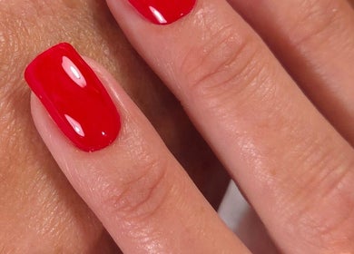Vibrant red nails beautifully done at Shardilly Nails, Hebburn, England, GB.