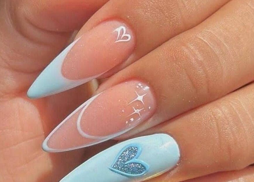Intricate nail art with heart design at Beauty Spa Zone, Cardiff, New South Wales, AU.