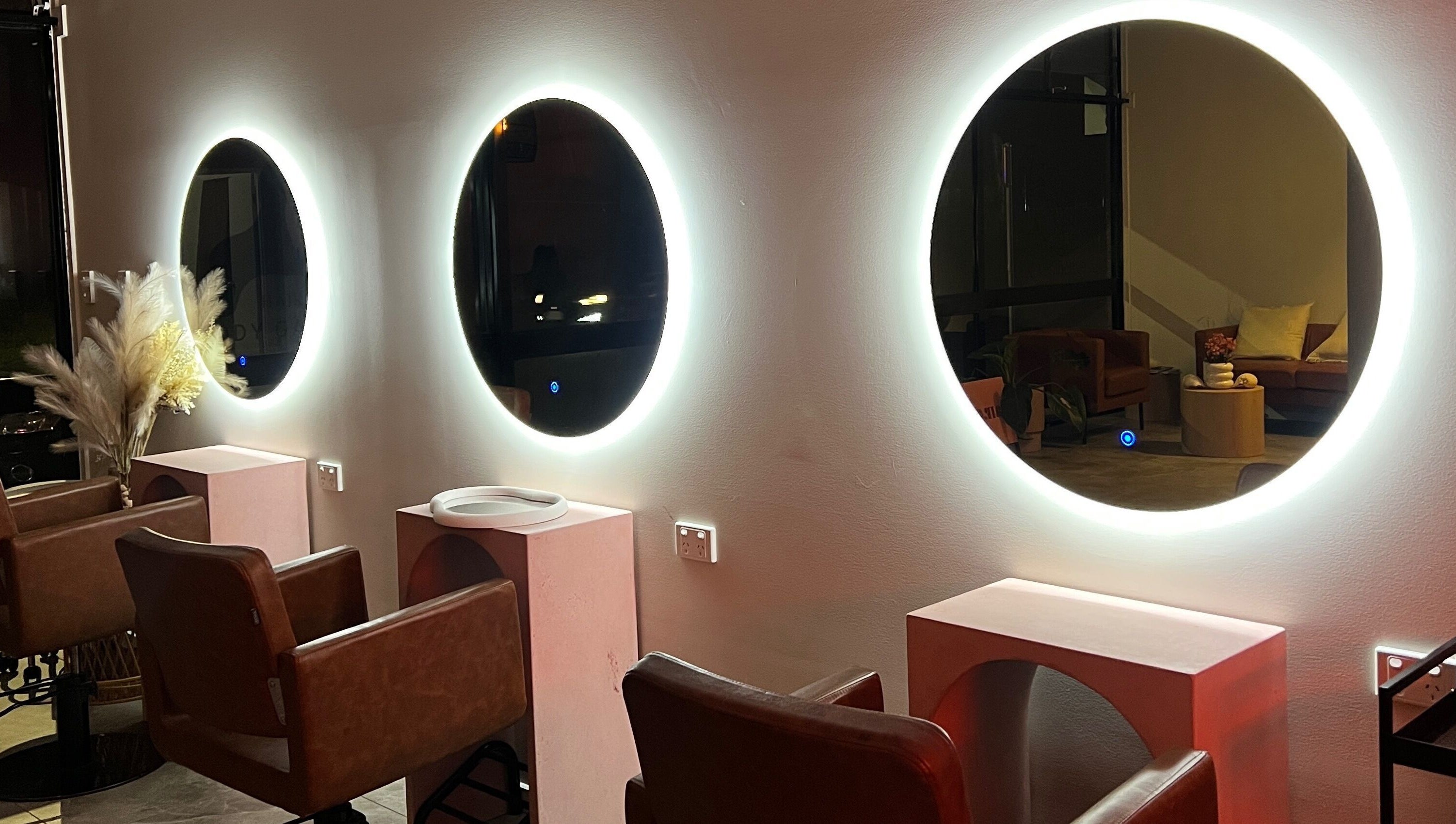 Elegant salon mirrors at Lux Aesthetix, Mooloolaba, Queensland, AU, enhancing the relaxing ambiance.
