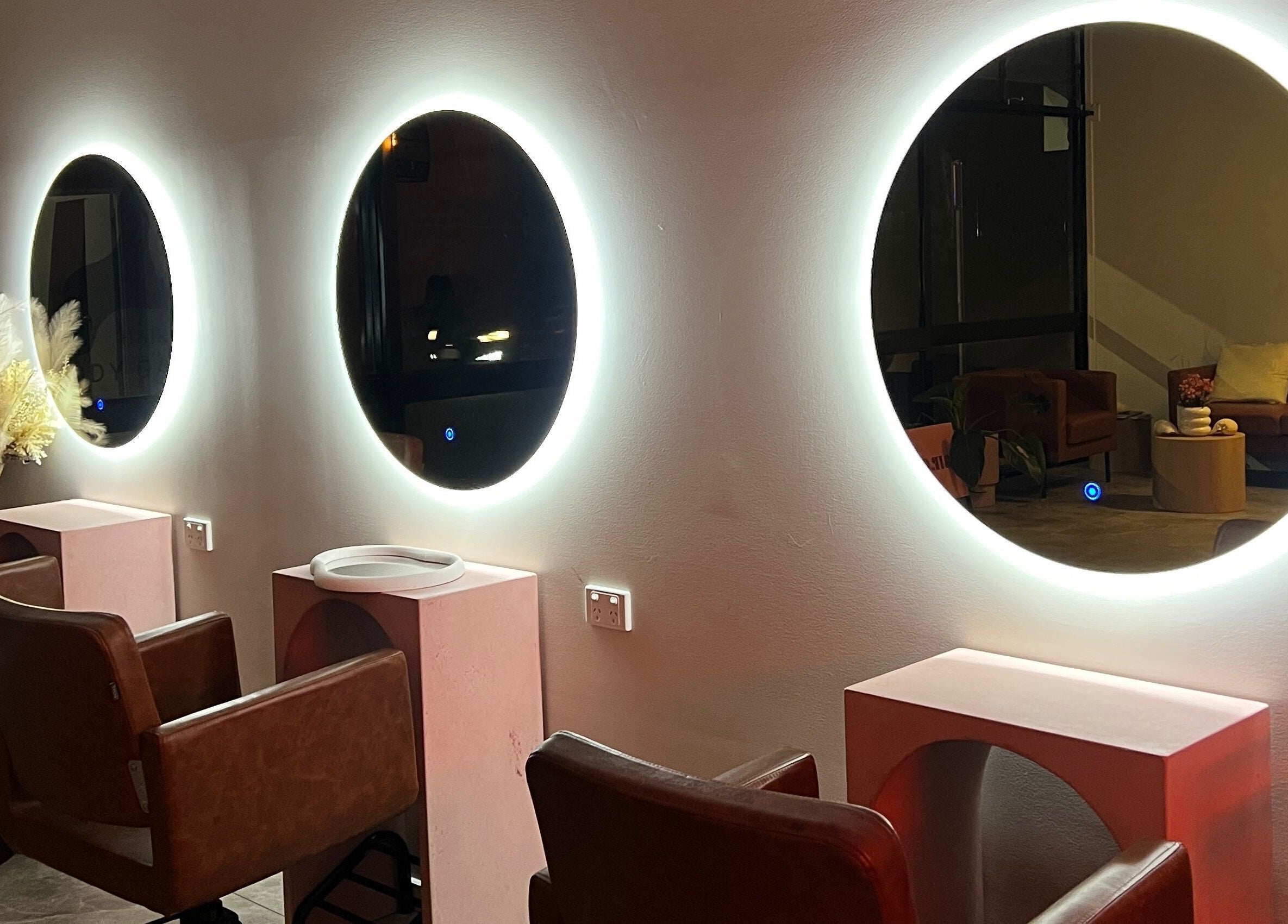Elegant salon mirrors at Lux Aesthetix, Mooloolaba, Queensland, AU, enhancing the relaxing ambiance.