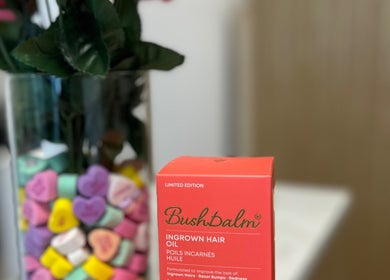 Bush Balm Ingrown Hair Oil displayed at Sculpted Aesthetic Miami in Miami Lakes, Florida, US.