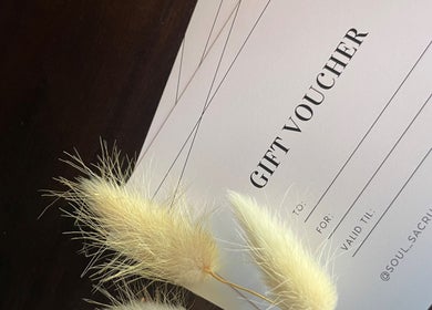 Soul Sacrum Massage Therapy gift voucher in Stoneville, Western Australia, AU with decorative pampas grass.