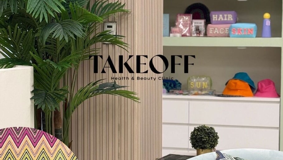 Modern, stylish interior of Take Off Beauty Clinic in Dubai, Dubai, AE, showcasing vibrant decor and greenery.