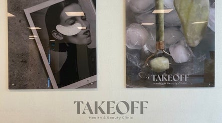 Artistic wall display at Take Off Beauty Clinic, Dubai, Dubai, AE featuring beauty and wellness decor.