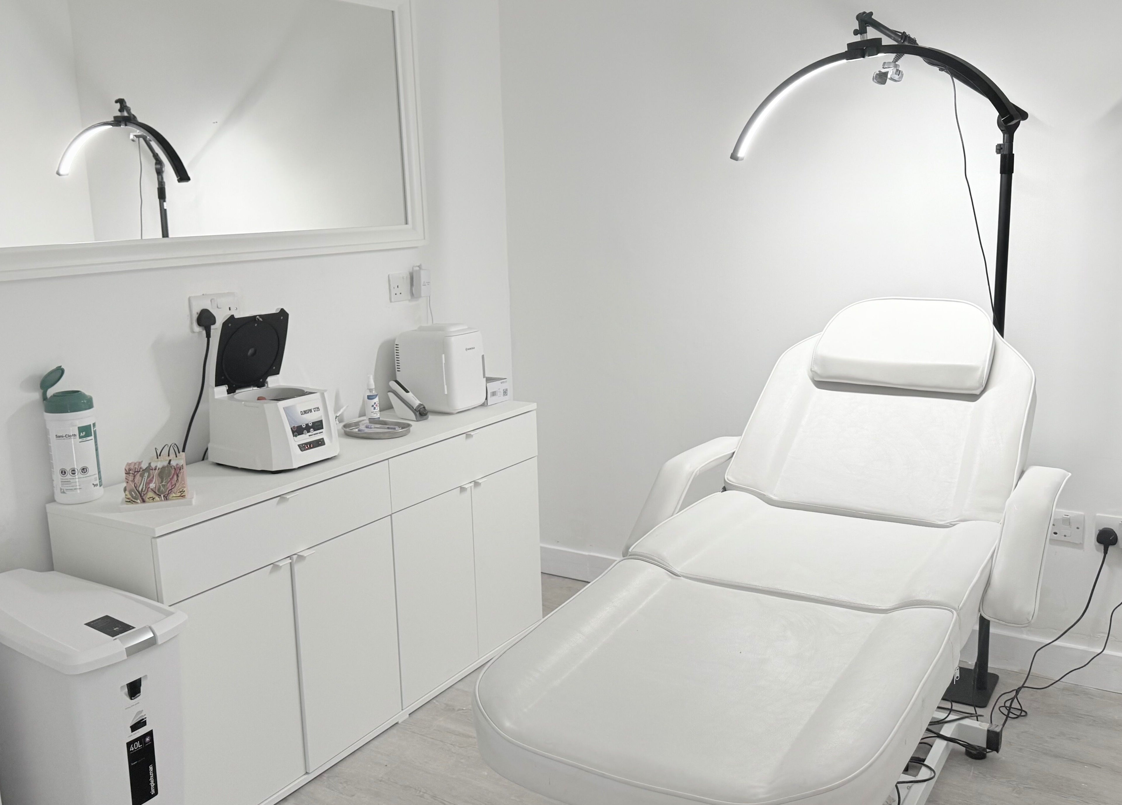 Elegant treatment room at Facefull Aesthetics, London, England, GB with modern equipment.