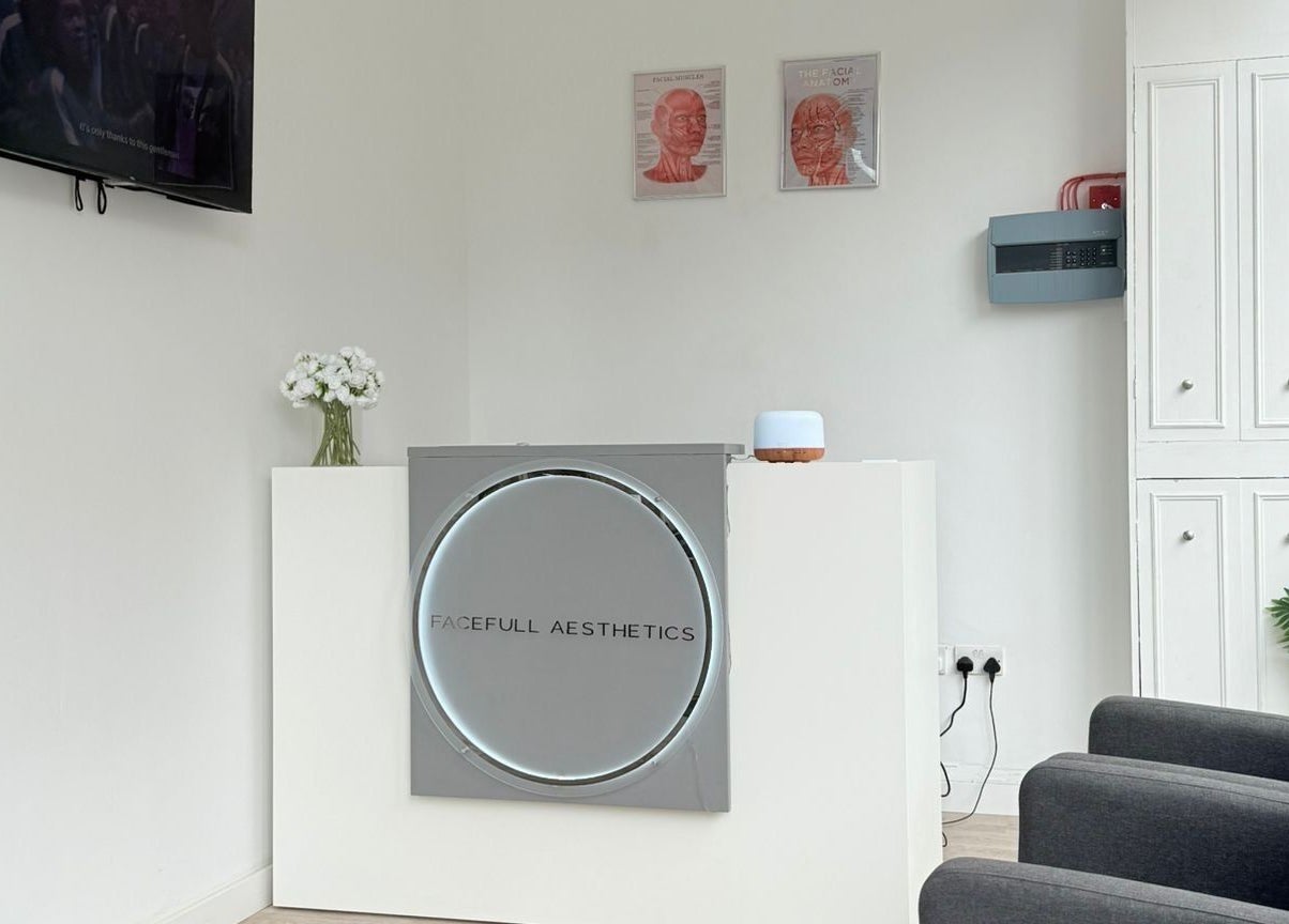 Reception area of Facefull Aesthetics in London, England, GB with modern decor and welcoming atmosphere.