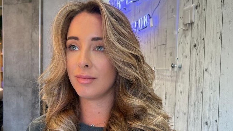 Woman with stylish hair at The Loft BB7 in Clitheroe, England, GB showcasing salon expertise.