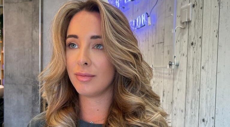 Woman with stylish hair at The Loft BB7 in Clitheroe, England, GB showcasing salon expertise.