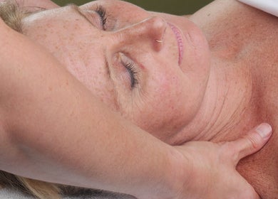 Client enjoying a soothing massage at Kanchani Therapies in Leek, England, GB for ultimate relaxation.