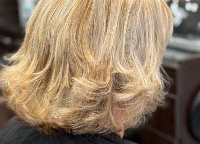 Blonde hair styled in waves at Bita Hair Studio, Southampton, England, GB.