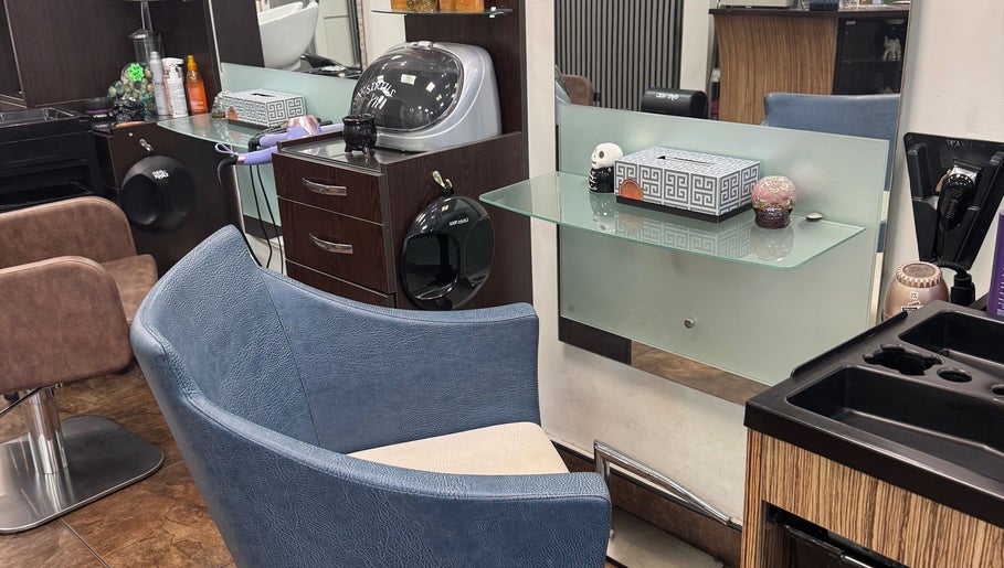 Modern salon station at Bita Hair Studio, Southampton, England, GB showcasing sleek design and styling tools.