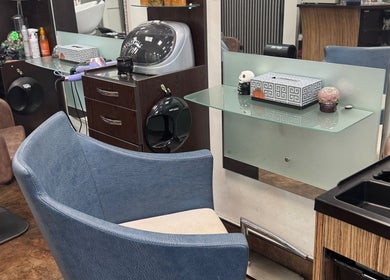 Modern salon station at Bita Hair Studio, Southampton, England, GB showcasing sleek design and styling tools.