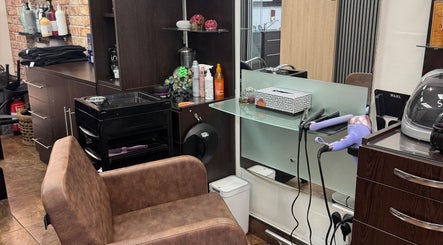 Modern styling station at Bita Hair Studio in Southampton, England, GB featuring elegant design and hair tools.