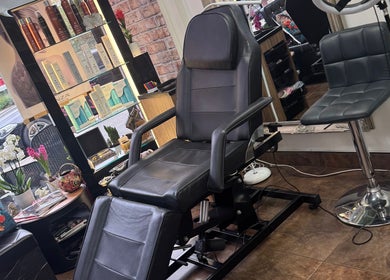 Modern salon chair and decor at Bita Hair Studio in Southampton, England, GB.