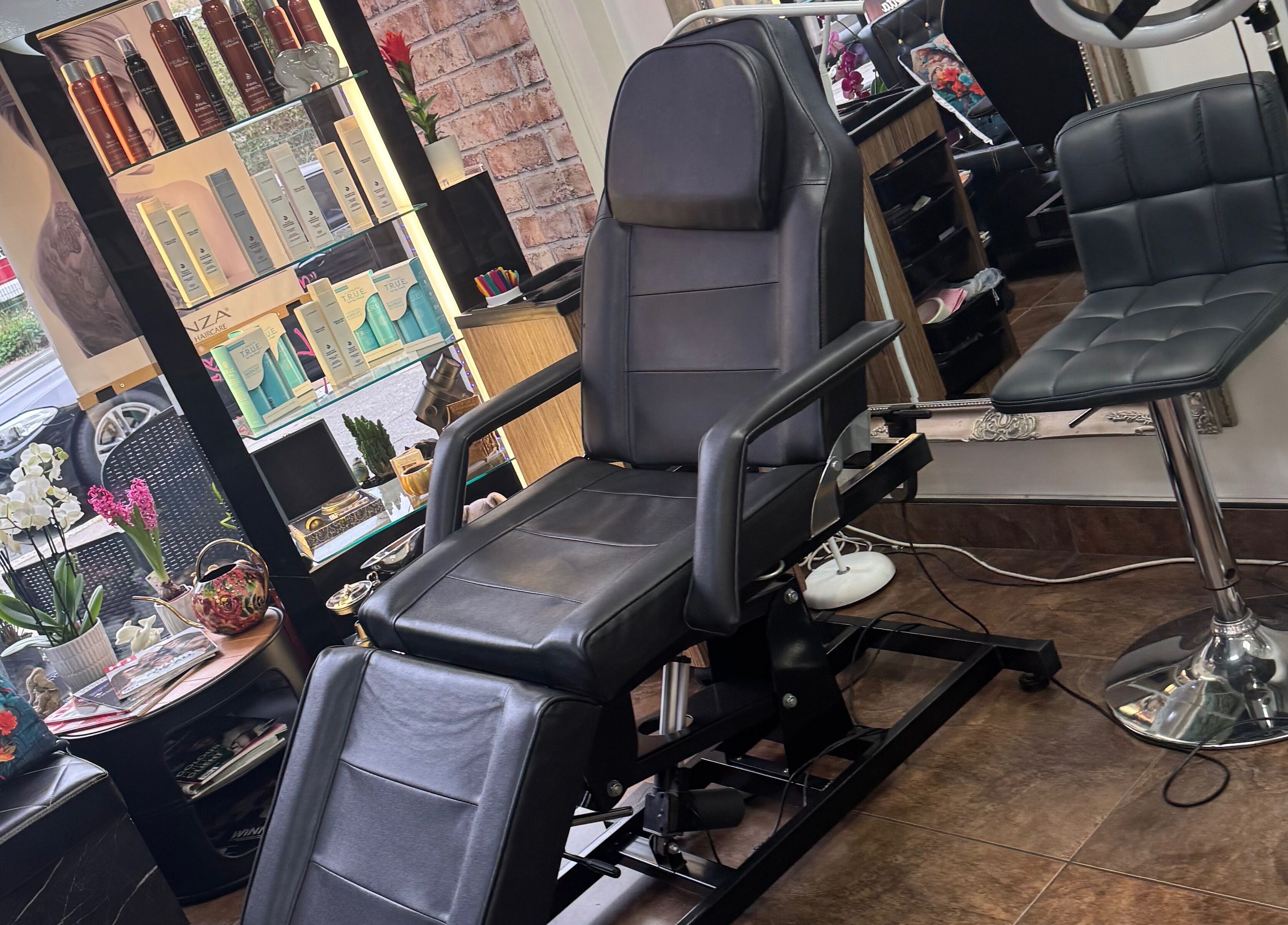Modern salon chair and decor at Bita Hair Studio in Southampton, England, GB.