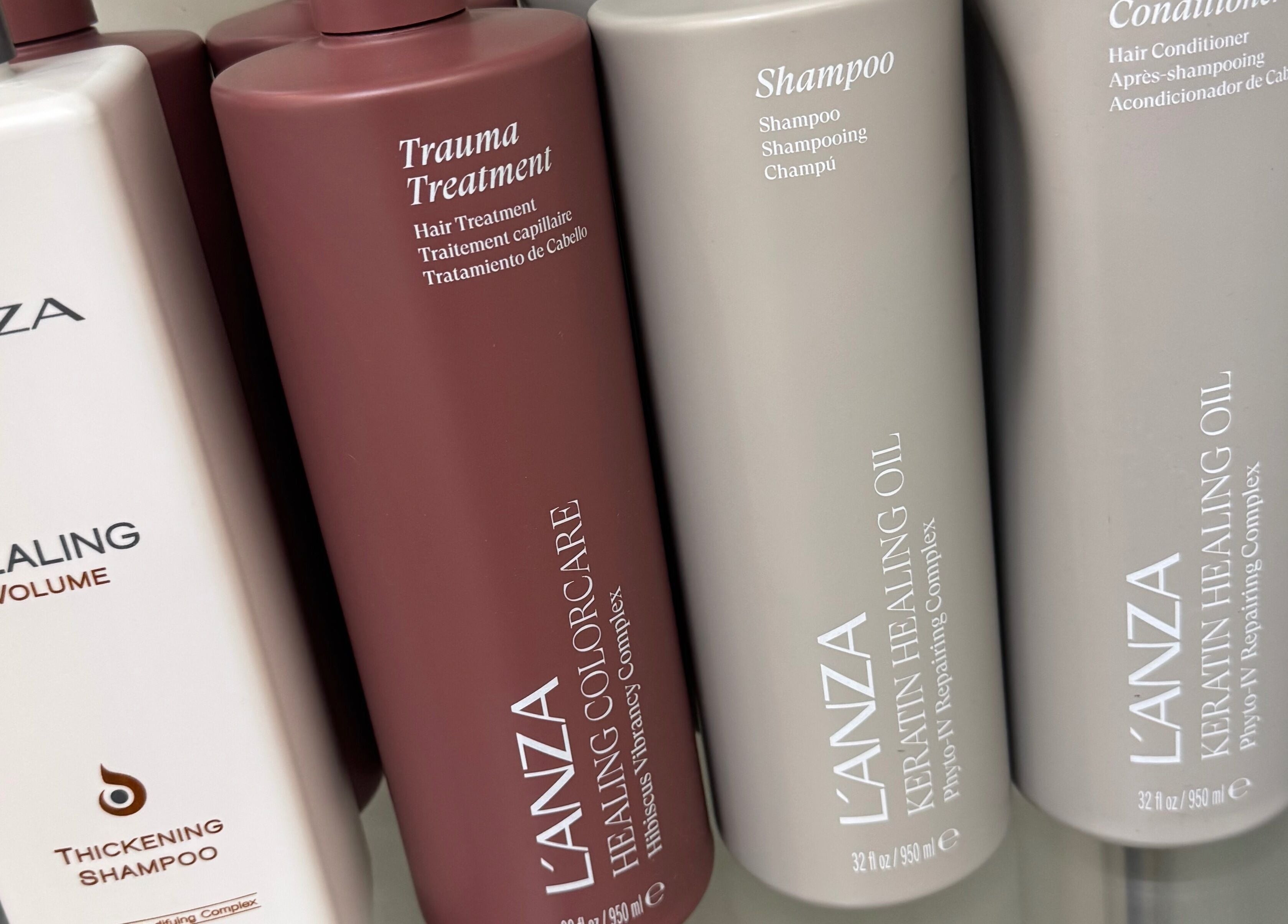 L'ANZA hair products on shelf at Bita Hair Studio, Southampton, England, GB, enhancing hair care routine.