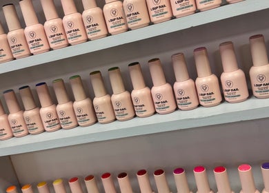 Colorful nail polishes displayed at Bita Hair Studio in Southampton, England, GB. Perfect for any manicure.