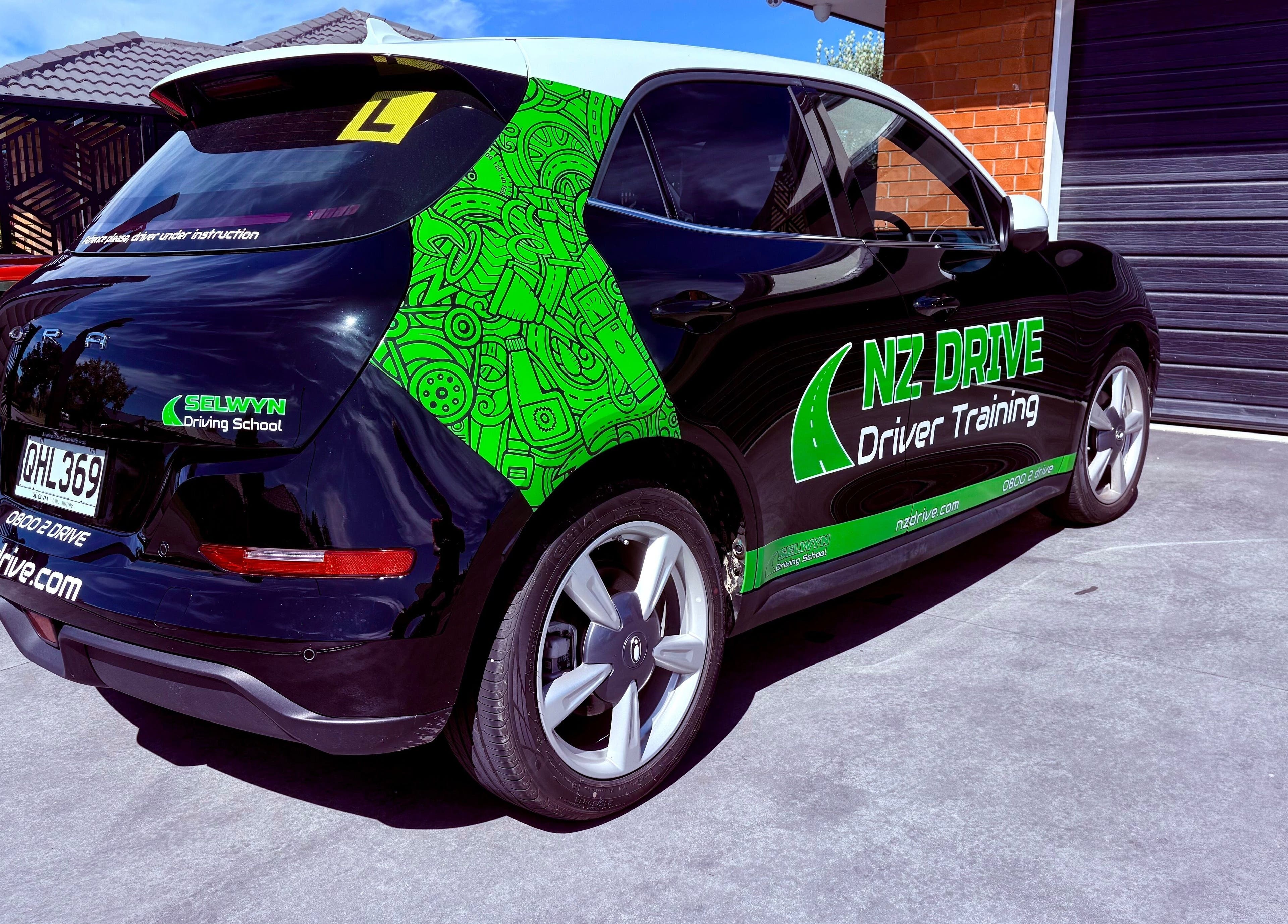 NZ Drive car at Hornby, Christchurch, Canterbury, NZ showcasing bright designs and professional driver training.