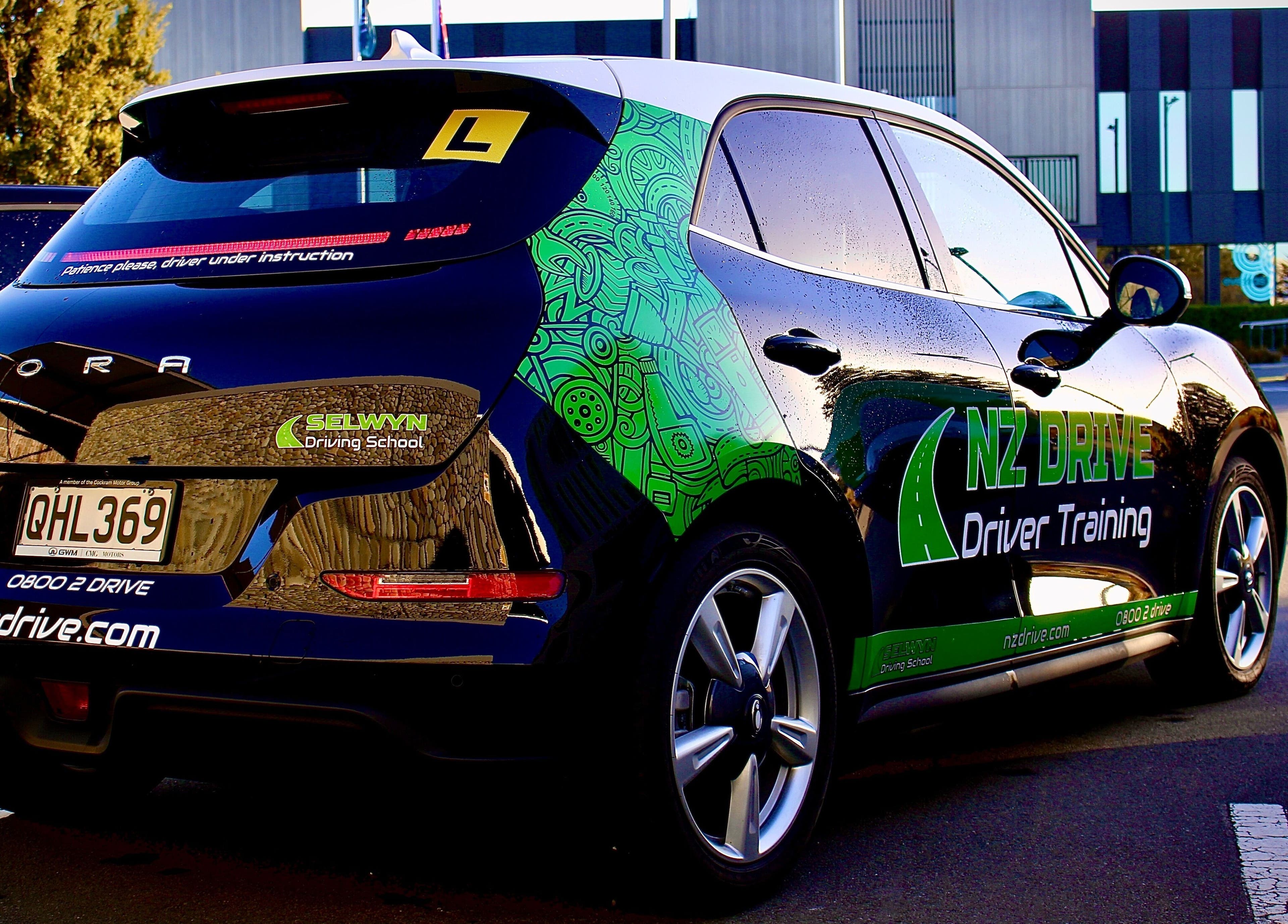 NZ Drive training vehicle on NZ Drive - City. Christchurch, Canterbury Region, NZ.