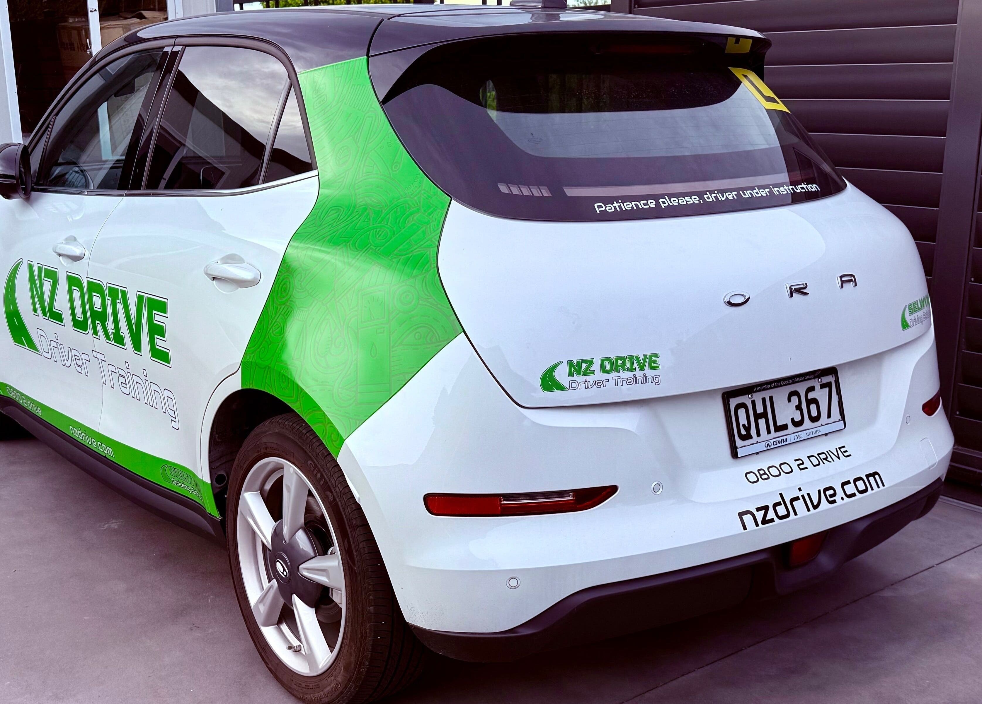 NZ Drive vehicle parked at NZ Drive - Cashmere, Christchurch, Canterbury Region, NZ. Modern design and branding.