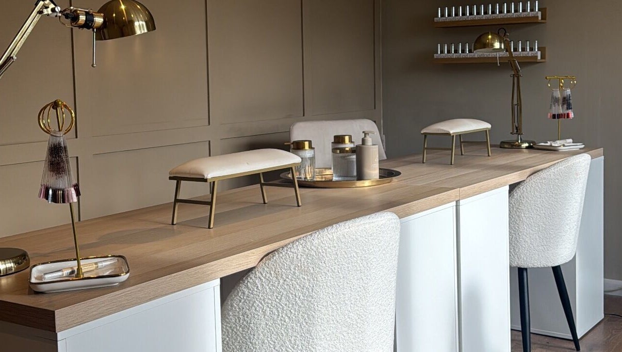 Luxurious nail station at Nails By Lucy Walsh, Llansamlet, Wales, GB with elegant decor and nail products.