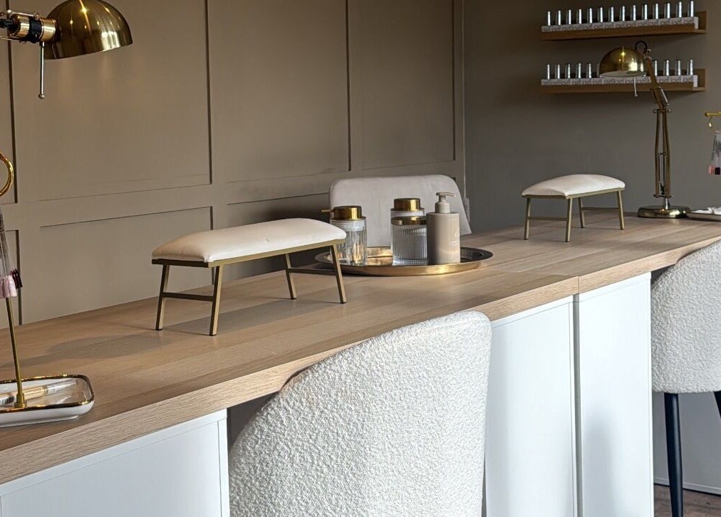 Luxurious nail station at Nails By Lucy Walsh, Llansamlet, Wales, GB with elegant decor and nail products.