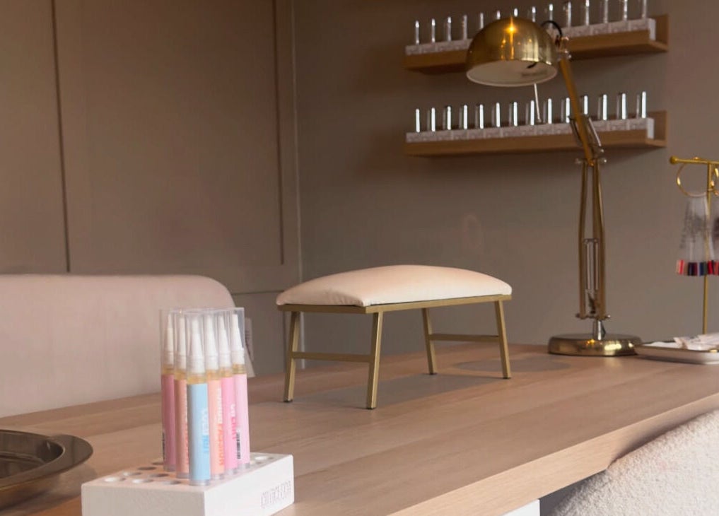 Nail table setup at Nails By Lucy Walsh in Llansamlet, Wales, GB with tools and decor.