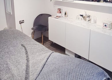 Elegant treatment room at Sassy Beauty Collective Derby with sleek furnishings in Derby, England, GB.