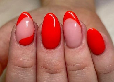 Stylish red manicure at Sassy Beauty Collective Derby, Derby, England, GB, showcasing modern nail art.