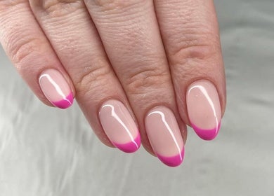 Elegant pink-tipped manicure at Sassy Beauty Collective Derby, Derby, England, GB, showcasing glossy finish.