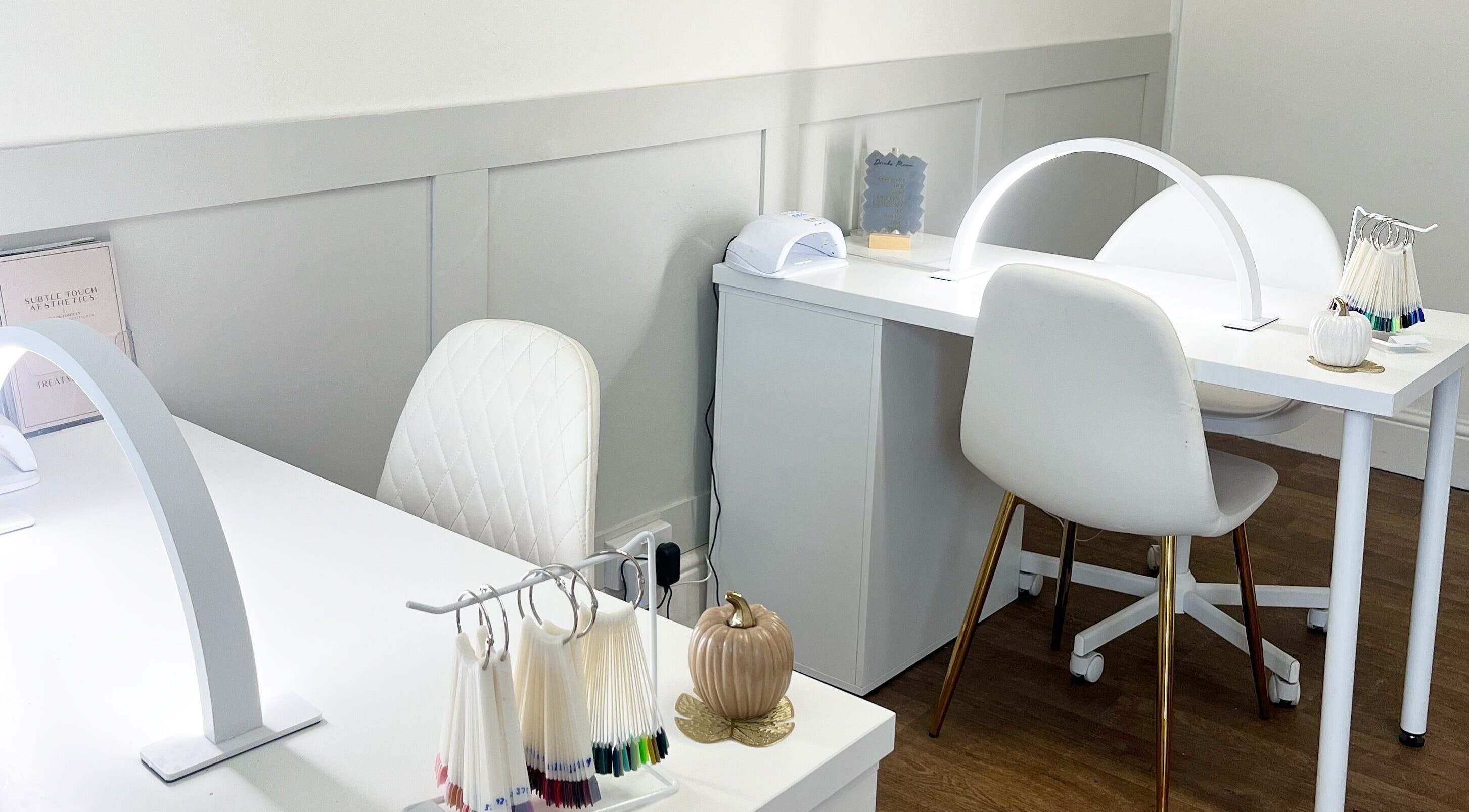 Elegant nail station at Sassy Beauty Collective Derby, England, GB, featuring modern design and decor.