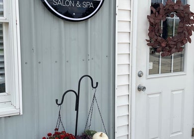 Entrance of 419 Hair & Co in Saint Henry, Ohio, US with stylish decor and salon sign.