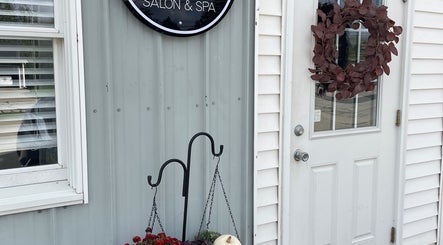 Entrance of 419 Hair & Co in Saint Henry, Ohio, US with stylish decor and salon sign.