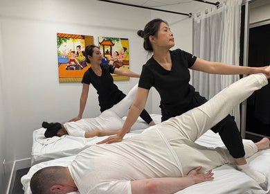 Therapists providing traditional Thai massage at Bua Thai Massage, Las Vegas, Nevada, US.