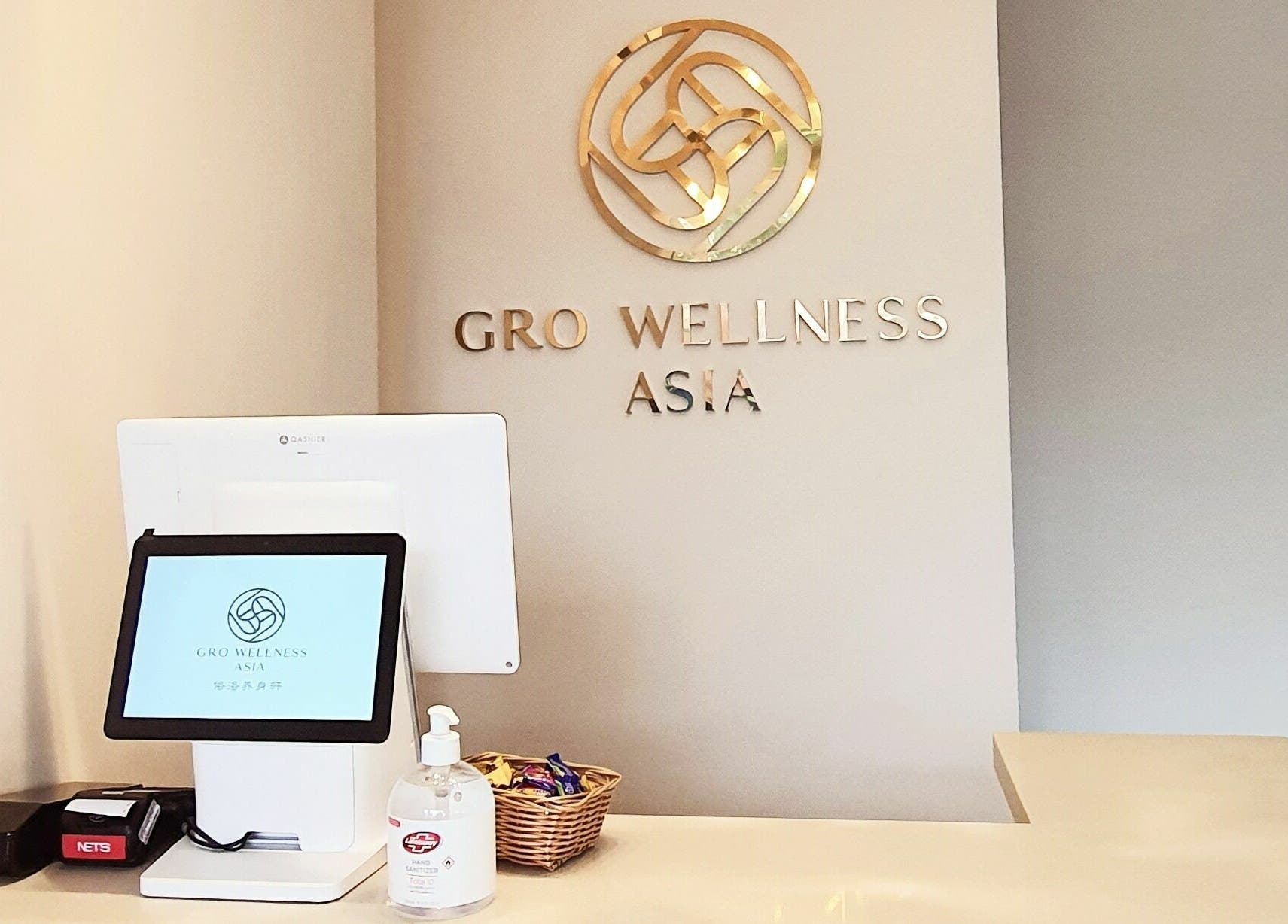 Reception area of Gro Wellness Asia 佫洛养生轩 at Farrer Park, Singapore, Singapore, SG with digital displays.