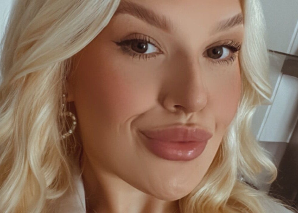 Close-up of a customer at Gee Gee's Beauty, showcasing styled hair and makeup in Nantwich, England, GB.