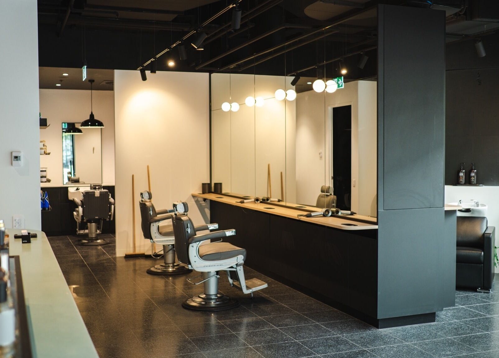 Modern interior of NOAH Canberra salon with stylish chairs in Canberra, Australian Capital Territory, AU.